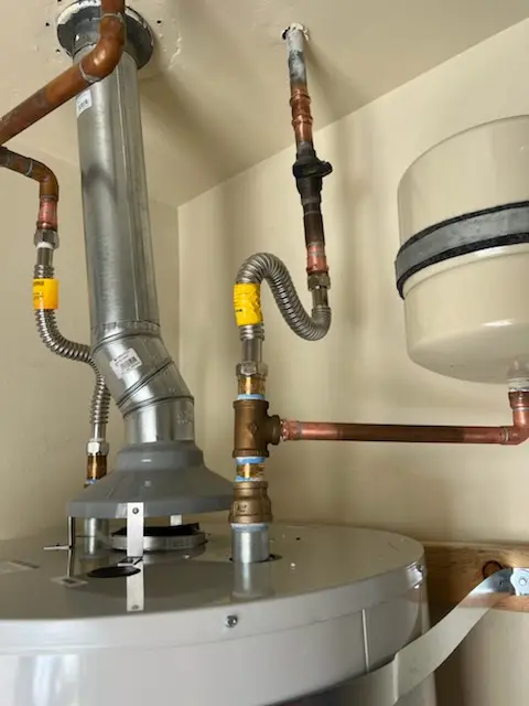 Water heater installation and plumbing repair in Elmwood